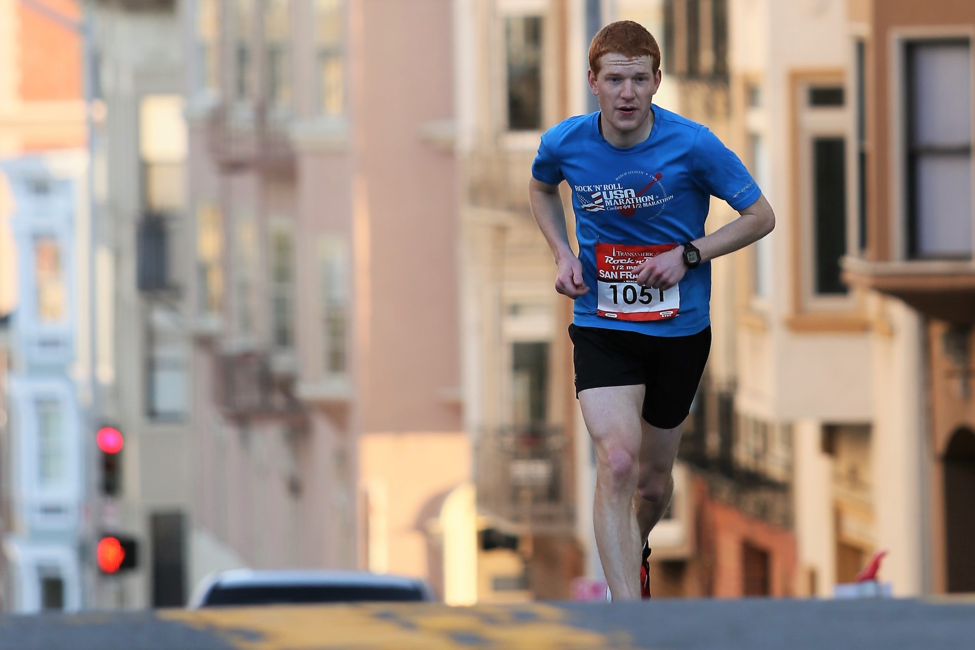 the image shows a man at the running triathlon marathon