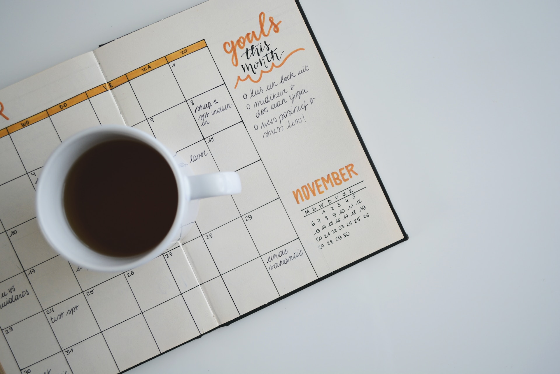 the image shows a cup of tea on the planner