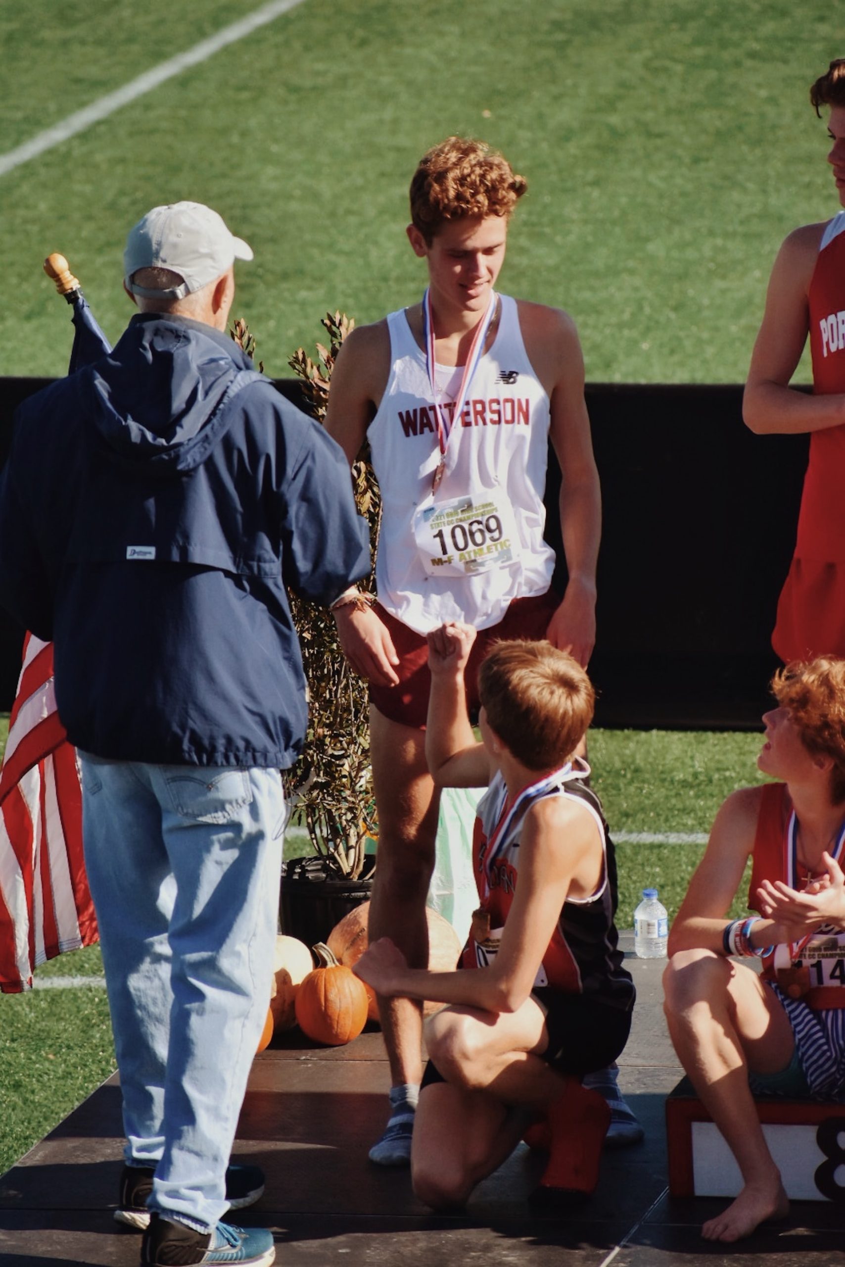 the image shows awarding ceremony at the competition