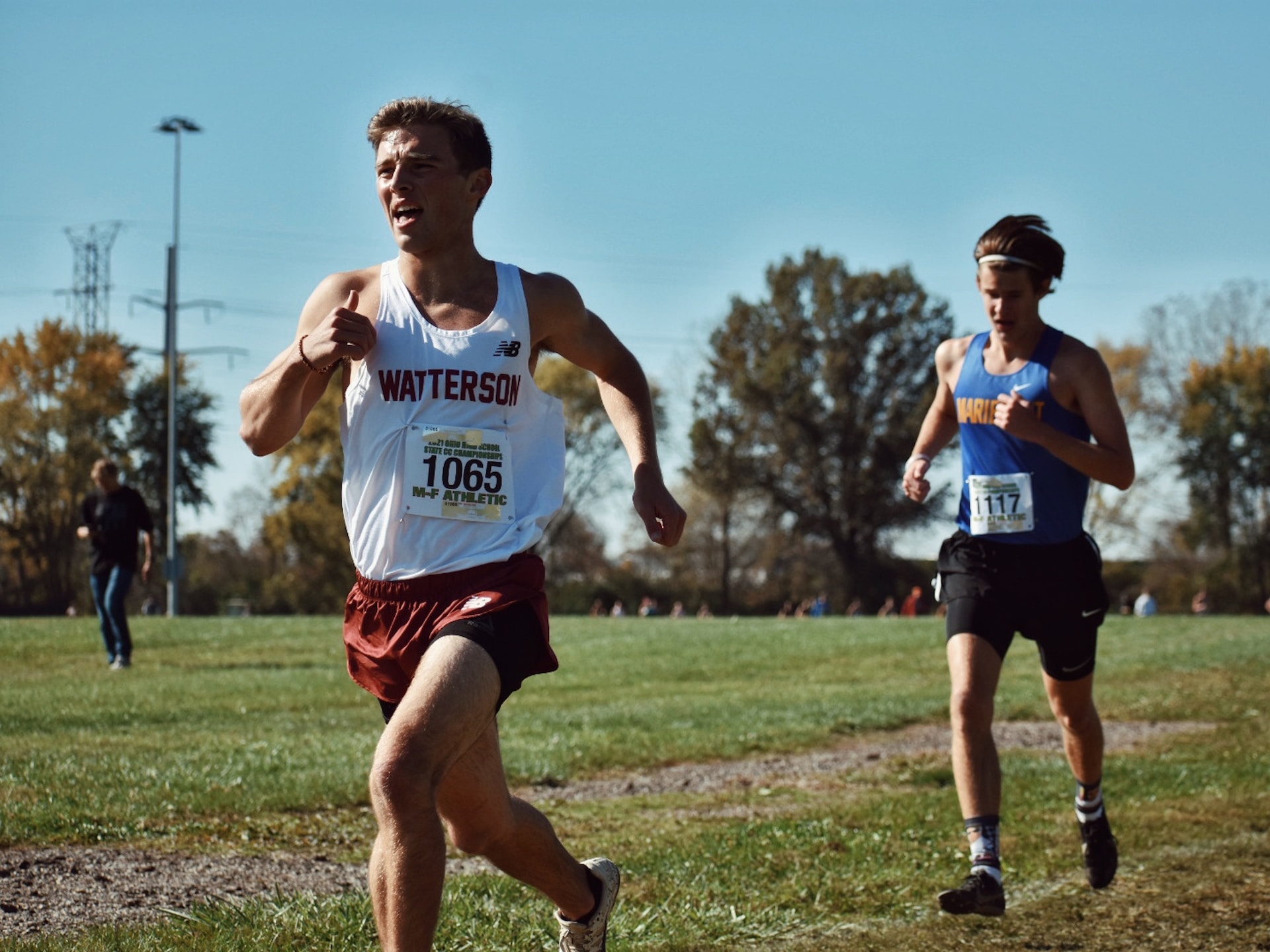 the image shows professional athletes running at the race